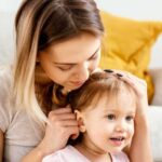 Увеличение лимфоузлов за ушами у ребенка: причины и эффективное лечение